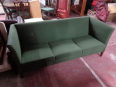 A modern three seater settee CONDITION REPORT: Height 74 cm, width 190 cm,