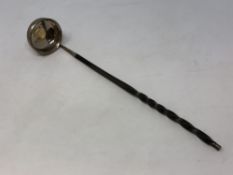 A Georgian Scottish silver toddy ladle set with a 1787 silver gilt shilling,