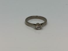 An 18ct gold solitaire diamond ring, approx. 0.