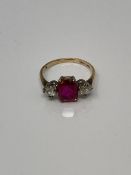 A 9ct gold dress ring set with synthetic stones, size O/P.