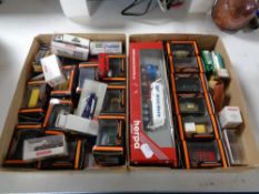 Two small trays of die cast model vehicles,