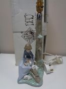 A large Nao table lamp with rabbit decoration, boxed.