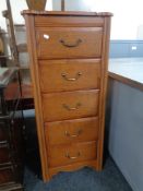 A reproduction five drawer audio chest