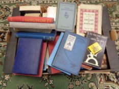 A box of various books,