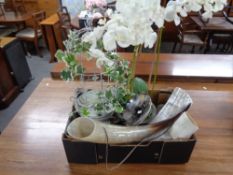 A box of artificial flowers,