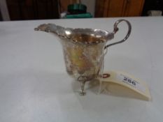 A silver cream jug, Birmingham 1921, 58.1g.