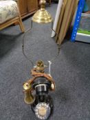 An early 20th century candlestick telephone/lamp