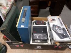 A box of Sinclair ZX-81 console, Black and Decker wall stripper, Imperial Typewriter,