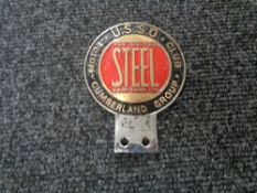 A vintage motor car badge - USSO Cumberland group, United Steel Company.