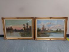 Walter Lewis (British Late 19th Early 20th century) : An Open River Landscape at Sunset with Rowing