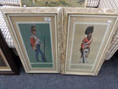 A pair of cream and gilt framed M Greensmith colour prints depicting a private of the 17th regiment