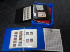 Six folders and albums of British twentieth century stamps