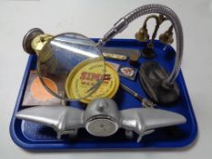 A vintage car wax tine clock, novelty aircraft clock,