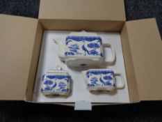 A Wade blue and white teapot, sugar basin and cream jug, in retail box.