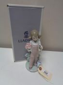 A Lladro figure - Spring, 05217, boxed.