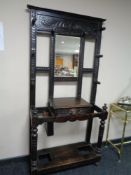 A Victorian oak mirrored hall stand