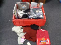 A crate of new and un-used clothing, scarf, gloves,