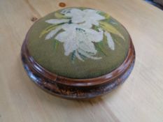 A Victorian tapestry circular stool
