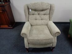 A contemporary oatmeal leaf design armchair