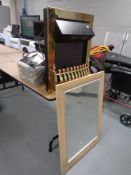 A brass framed contemporary fire together with mirror and box of books