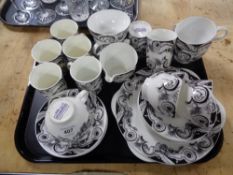 A tray of Elizabethan storm pattern tea china