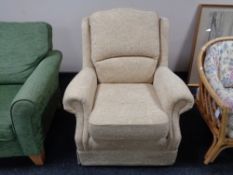 A contemporary oatmeal floral design armchair