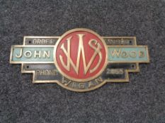 An early 20th century brass hand painted sign 'J.W.S.
