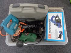 A crate of tools, electric drill, jigsaw, router, electric planer,