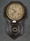An early twentieth century Seikosha Japanese wall clock with pendulum