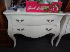 A reproduction continental style two drawer white chest of drawers CONDITION REPORT: