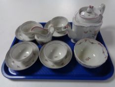 A Newhall porcelain teapot and cover, circa 1790, of commode form, puce mark to underside,