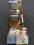 A box of a quantity of Airfix and other model making kits