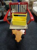 A vintage folding chair together with a wooden plant stand