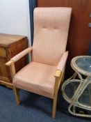 A beech framed contemporary armchair