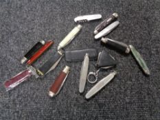 A tin of pen and pocket knives