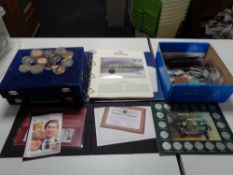 A quantity of collector's coins, plastic coin wallets,