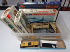 A box of model making kits, military vehicles,