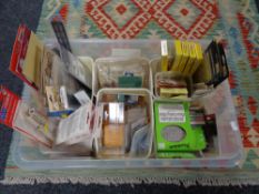 A crate of model making railway model parts and accessories