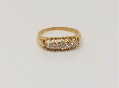 An antique 18ct gold five stone diamond ring, Q CONDITION REPORT: 4.