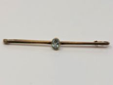 A gold aquamarine bar brooch CONDITION REPORT: 2.