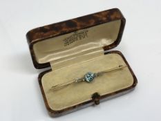 A yellow gold topaz and diamond brooch, 3.65g.