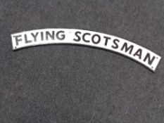 A cast iron black and white Flying Scotsman