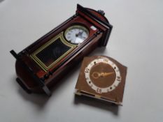 A wall clock and a mid 20th century copper mirrored mantel clock