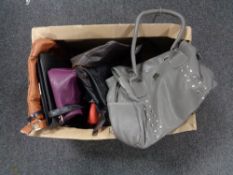 A box of assorted lady's leather handbags