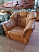 A brown leather armchair