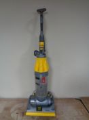 A Dyson DC07 Origin upright vacuum cleaner