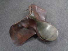 A brown leather saddle