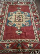 A Caucasian design rug,