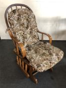 An oak framed rocking/slider chair