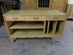 A 20th century blond oak entertainment stand